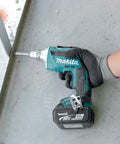 18V LXT Brushless Cordless Drywall Screwdriver Bare Tool With Push Drive Technology shown in use on metal framing.