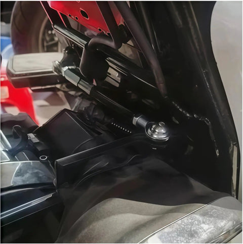 Close-up of Harley Touring Frame Stabilizer Bar for Road Glide 2009-2026 CNC Aluminum Black installed under motorcycle seat