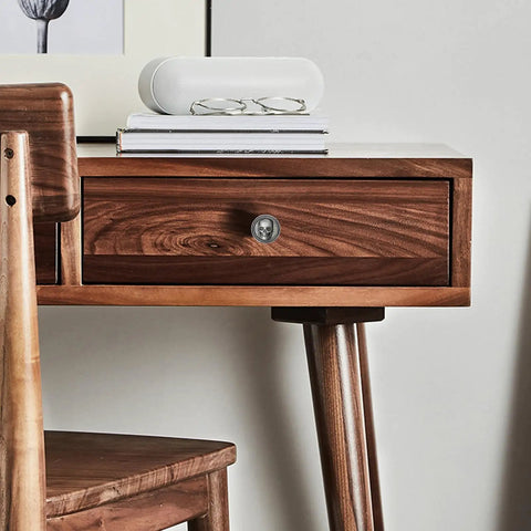 Six Pack Vintage Skull Cabinet Knobs Set With Zinc Alloy Single Hole Drawer Pulls on wooden desk in rustic setting
