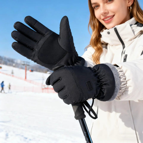 Black Warm Waterproof Winter Ski Gloves For Men And Women With All Day Warmth, windproof snow gloves being worn on a snowy day