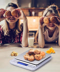 Two people using Ultra Precise Digital Kitchen Scale With Backlit Display, 0.001 Oz And 0.01 g, 500 g Capacity, Tare Function