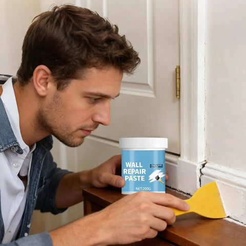 Person using Wall Repair Paste For Quick Fix And Seamless Finish, Waterproof Drywall Crack Filler for renovation on a door frame.