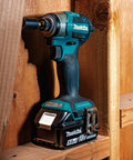 18V LXT Brushless Cordless Impact Driver 5.0Ah in wooden frame setting