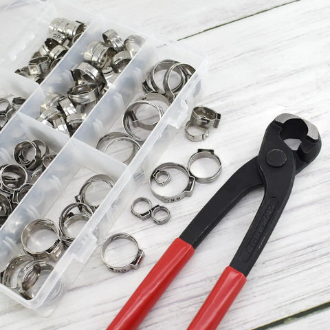 Beefy Heavy Duty PEX Clamp Kit With Cinch Pliers, 130 Piece Stainless Steel Crimp Rings And Clamp Set For PEX Tubing on wooden background