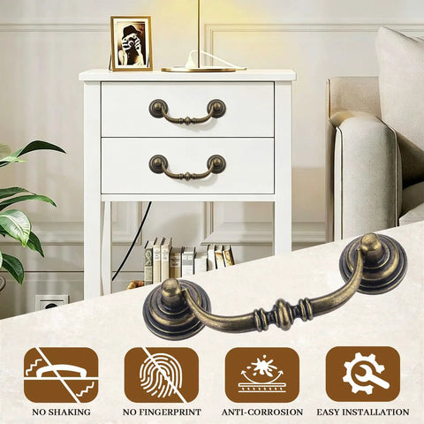Old-School Brass Drop Bail Cabinet Pulls Set Of 8, 3.5 Inch Center Hole installed on white cabinet with sofa backdrop