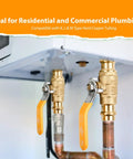 Two 1/2-inch brass ball valves with orange handles installed on copper pipes