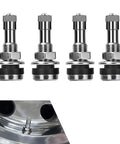 Four Beefy Brass Tire Valve Stem 1.5 Inch With Rubber Gasket, Fits 0.453 Inch And 0.625 Inch Rim Holes in a black finish