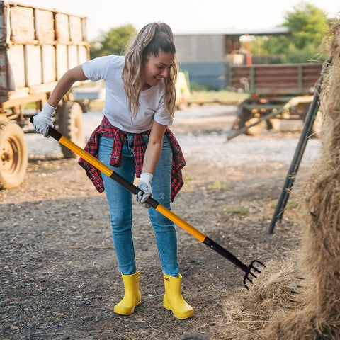 Heavy Duty Garden Pitch Fork With 5 Tines And Fiberglass Handle 58 Inches used by gardener for hay