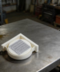 Digital Inclinometer Angle Finder With Magnetic Base for Pros and DIYers on metal surface in workshop, industrial grade ABS.
