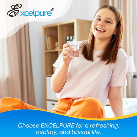 Woman smiling holding a glass of water near window with natural light, representing Two Pack Fridge Water Filter Replacements Using 0.5 Micron Coconut Shell Carbon Compatible With Whirlpool Everydrop Filter 5 For Fresh Tasting Water.