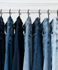 Jeans hanging on a chrome rod with S hooks, 18 Pack 4 Inch Heavy Duty S Hooks For Oval Ceiling Pot Rack And Kitchen Organization Durable Hangers For Pans Pots Utensils Spoons Towels Bags Clothes Plants Black