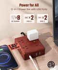 Brown Wood Grain 10 Ft Flat Plug Power Strip With Surge Protector, 8 Outlets and 4 USB Ports on desk charging phone