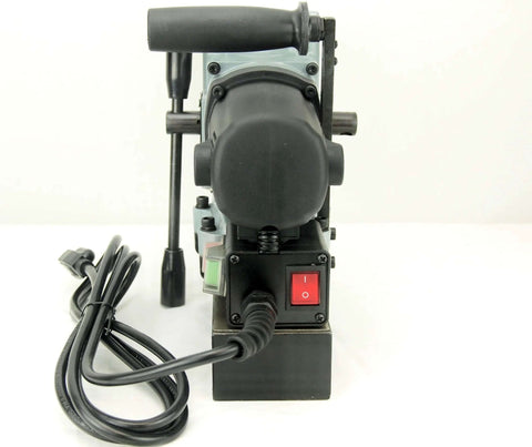 Front view of Amazon TYP-28A mini magnetic drill; black/gray body, red on/off switch, power cord.