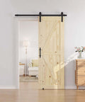 30 Inch By 84 Inch Sliding Barn Door With 5 Foot Hardware Kit Included, Unfinished Solid Spruce, installed in modern home interior.