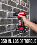 Compact Brushless Hammer Drill Kit With 12V Power Core used on a brick wall, showcasing 350 in-lbs of torque.