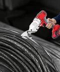 21V Brushless Cordless Sheet Metal Shear With Two Batteries And 360 Degree Pivoting Head cutting through steel wire.