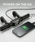 Beefy 800 Lumen USB Rechargeable Bike Headlight With 9.05 Inch Aluminum Handlebar Extender next to charging phone