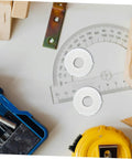 No Sweat Two Sets Grinding Wheel Diameter Sleeves Plastic Bushing Adapter Kit For Bench Grinder on workshop table with tools.