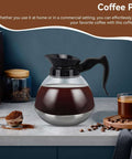 Universal Coffee Pot Replacement Carafe With Tight Fit Spout And Black Grip For Commercial And Home Use on countertop