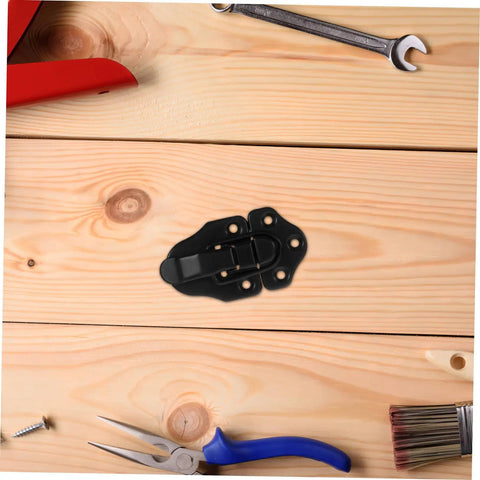 8 Piece Metal Buckle Kit With Duckbilled Toggle Latch on wooden surface with tools displayed around.