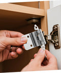Installing silent self-closing cabinet hinges on a kitchen door for quiet operation and heavy-duty durability.