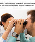 Optical Digital Pupilometer With Memory Function LCD Display IPD Meter For Eyeglasses Fitting Pro Grade Precision Diopter Compensation Pupil Distance Measurement Device Dope Refraction Tool used on a man during eye exam
