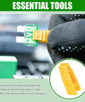 Image of a person using a yellow fuse puller tool with a green mini blade fuse, part of the 120Pcs Car Mini Blade Fuse Assortment Kit With Heavy Grip Puller Wrench 2A To 35A.