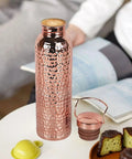 Copper Water Bottle 800ml Insulated Travel Cup With Anti Slip Grip featured with removable lid on a table