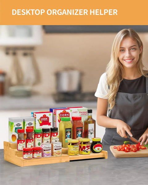 Premium Grade Three Tier Natural Bamboo Spice Rack With Adjustable Cabinet Organizer Shelf For No Sweat Kitchen Countertop Storage and Slick Rust Proof Home Setup with spices organized on kitchen countertop.