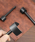 Leather Corner Punch Set With V Shaped Punches In 0.98 In, 1.18 In And 1.57 In shown on leather surface