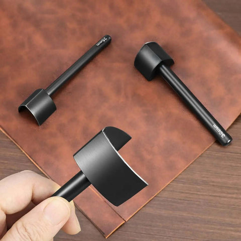 Leather Corner Punch Set With V Shaped Punches In 0.98 In, 1.18 In And 1.57 In shown on leather surface