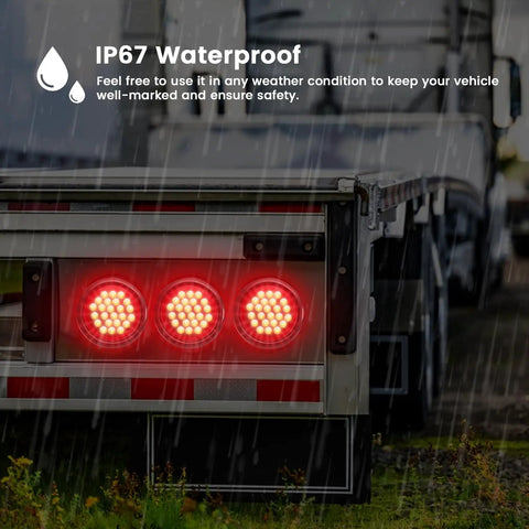 4-Inch Round LED Trailer Lights Pack of 4, 24-LED High-Output Red Tail Lights on truck in rain, IP67 Waterproof