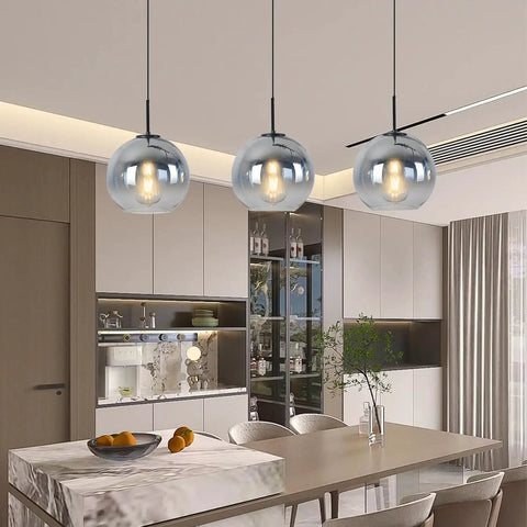 Dope Modern Black Globe Pendant Lights Two Pack over kitchen island, glass silver gradient orbs, warm glow ceiling fixture