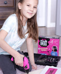 Girl using Girls Power Drill Set With Realistic Drilling Action 60 Piece Tool Kit Rechargeable Cordless Pink Drill With LED Light Learning And Building Construction Kit For Kids Includes Carrying Case And Charger