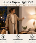 Woman using Wireless Outlet Kit With Ergonomic Round Remote And Magnetic Wall Base in living room