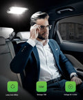 Man in car interior with Super Bright LED Dome Light Kit For RV And Car Interior 12V To 85V 800 Lumens Ceiling Lights With On Off Switch