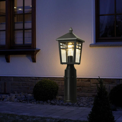 Dusk To Dawn Post Mount Outdoor Light Head With Seeded Glass illuminating a garden pathway, showing energy saving exterior pier lamp fixture