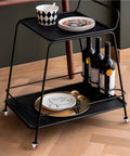 Front view of a black metal two-tier rolling cart with red 1-inch fixed caster wheels