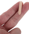 Hand holding one piece of 100 Pcs Wooden Dowel Pins 6x30mm Round Unfinished Fluted Beveled Ends Hardwood Dowels Rods For DIY Crafting And Woodworking Projects