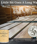 Factory setting with All Wood Finish With Linseed Oil And Beeswax application on wood panels, showcasing smooth finish and coverage.