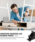 Man assembling table with Beefy Black Iron Folding Spring Hinge Table Leg Brackets Set For Heavy Duty Support On Tea Tables.