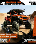 Heavy Duty Wheel Chock And E Track Tie Down Straps Kit Four Pack securing ATV on trailer in desert terrain