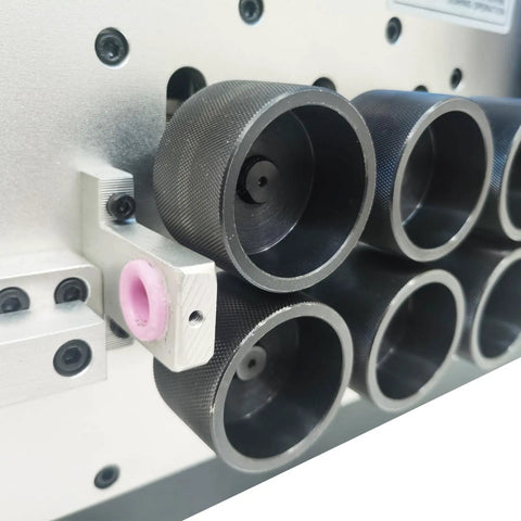 Close-up of Jaryannix Automatic Wire Stripping And Bending Machine 110V showing precision cutting rollers and control components.
