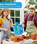 Front view of blue microfiber cleaning rags box (100-count) held by a man and woman in aprons.