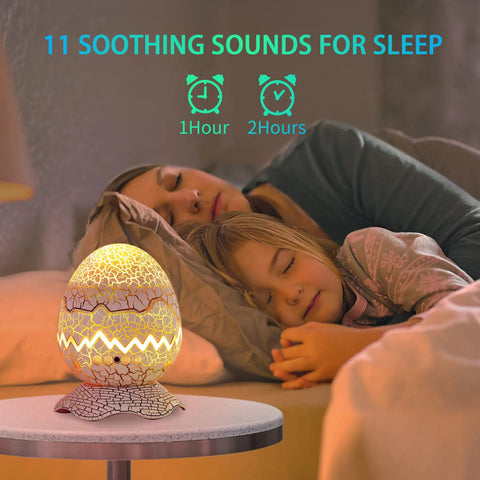 Mother and daughter sleeping with the 4 In 1 Aurora Galaxy Projector With Bluetooth Speaker White Noise Night Light And Moving Stars For Bedroom Decor Kids And Adults Beaming Northern Lights Ambience For Sleep And Christmas Vibes Beige Finish.