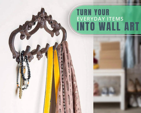 Knockout Five Hook Cast Iron Wall Hanger In Rustic Brown Fleur De Lis Farmhouse Entryway Coat Rack holds scarves and keys.