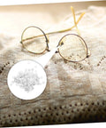 Metal Eyeglass Screw Washers Set, 200 Pcs Rimless Glasses Gaskets and Frame Tighteners on knitted fabric with glasses