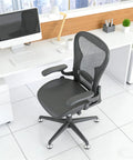 Ditch Those Dang Office Chair Casters With This 5 Pack Of Low Profile Bell Glides on a modern office chair in a sleek workspace.