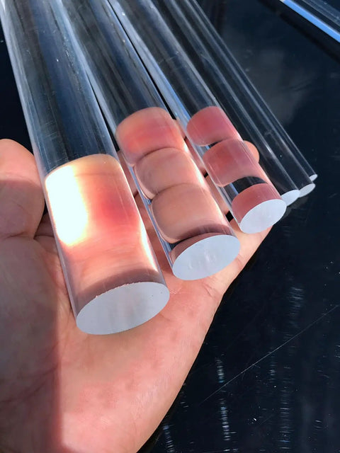 Crystal Clear Acrylic Stair Handrail Built Like A Tank With Corrosion Resistant Brackets For Quick Wall Mounting and Serious Non Slip Grip. Handheld acrylic tubes showcase different widths.