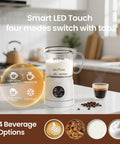 4 In 1 Milk Frother With Led Touch Screen And Ceramic Lined Bottom, 13.5 Oz Capacity For Barista Grade Cafe Style Lattes Cappuccinos And Macchiatos At Home, Transparent Glass Shows Frothing, White on kitchen counter next to espresso